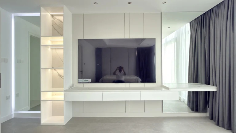 Bespoke TV unit and media wall in Dubai with LED-lit shelving