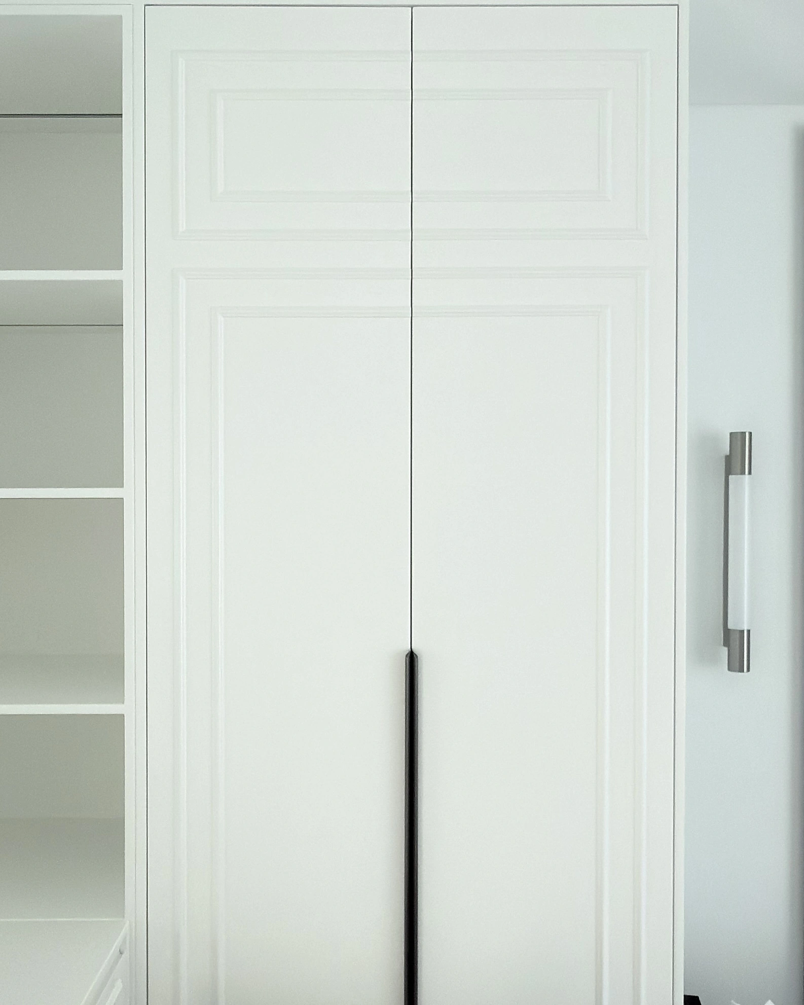 Panelled fitted wardrobe doors in Dubai finished in white PU paint at 10 percent gloss